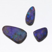 THREE UNMOUNTED BLACK BOULDER