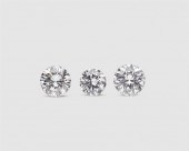 THREE UNMOUNTED DIAMONDSThree