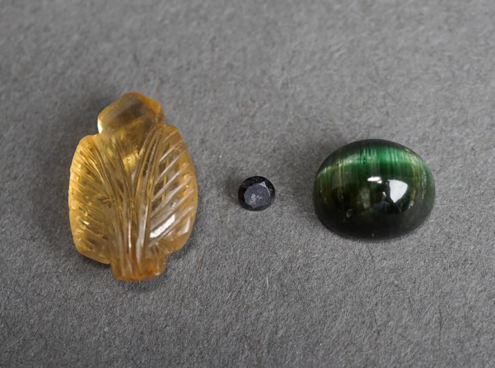 THREE UNMOUNTED GEMSTONESThree