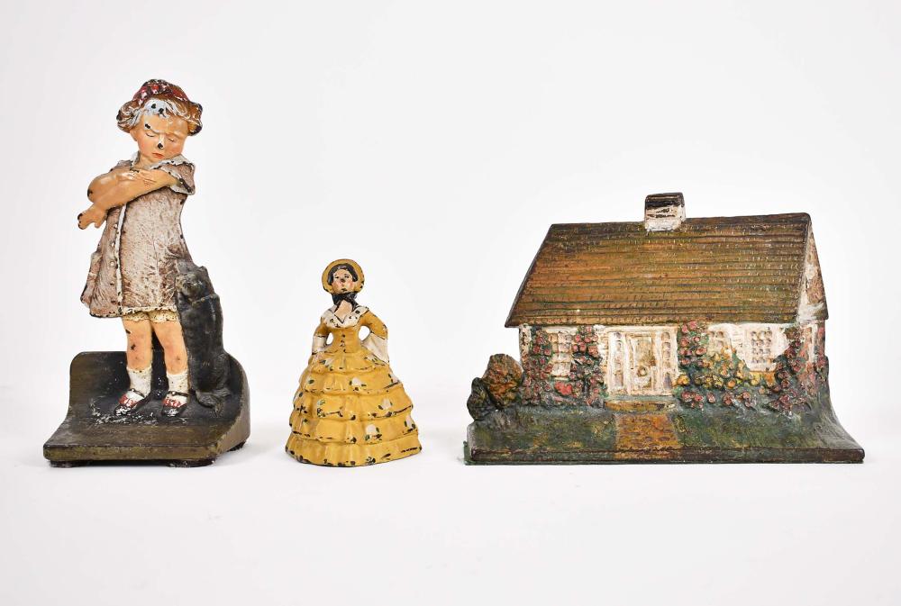 THREE VARIED PAINTED CAST IRON