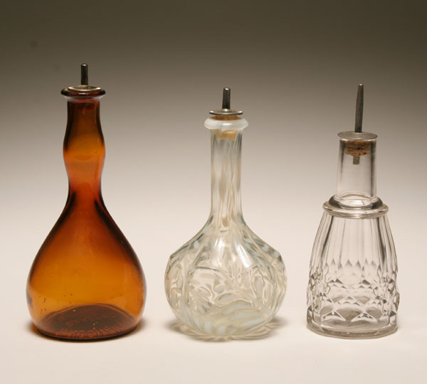 Three Victorian barber/hair tonic