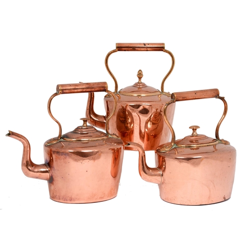 Three Victorian copper kettles, one