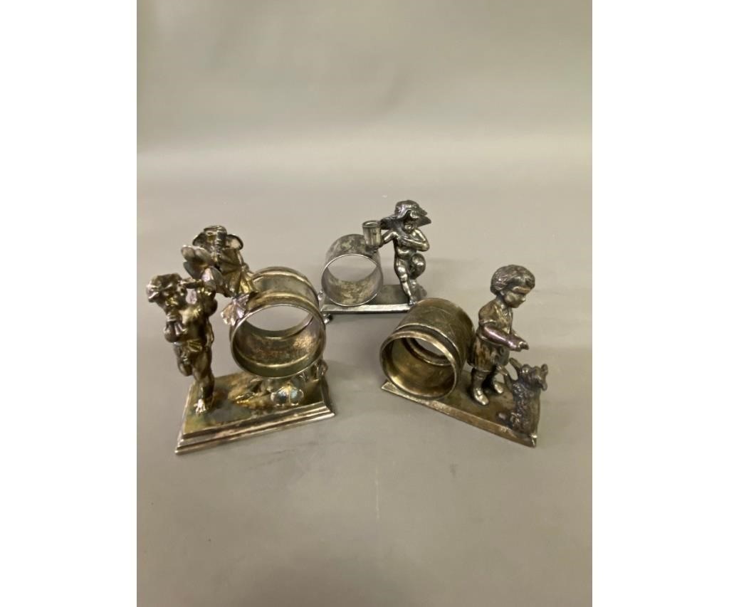 Three Victorian silver plate napkin
