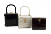 THREE VINTAGE ACRYLIC PURSESTh
