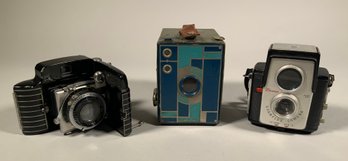 Three vintage art deco cameras,