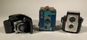 Three vintage art deco cameras