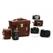 THREE VINTAGE CAMERAS AND ACCE