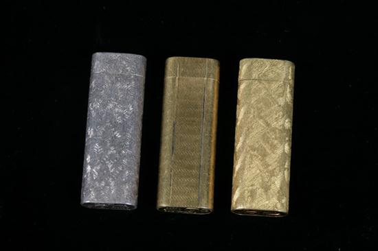 THREE VINTAGE CARTIER LIGHTERS