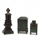 THREE VINTAGE CAST IRON APPLIA