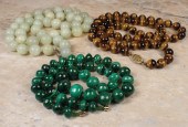 THREE VINTAGE GEMSTONE BEAD NE