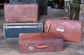 Three vintage leather suitcase