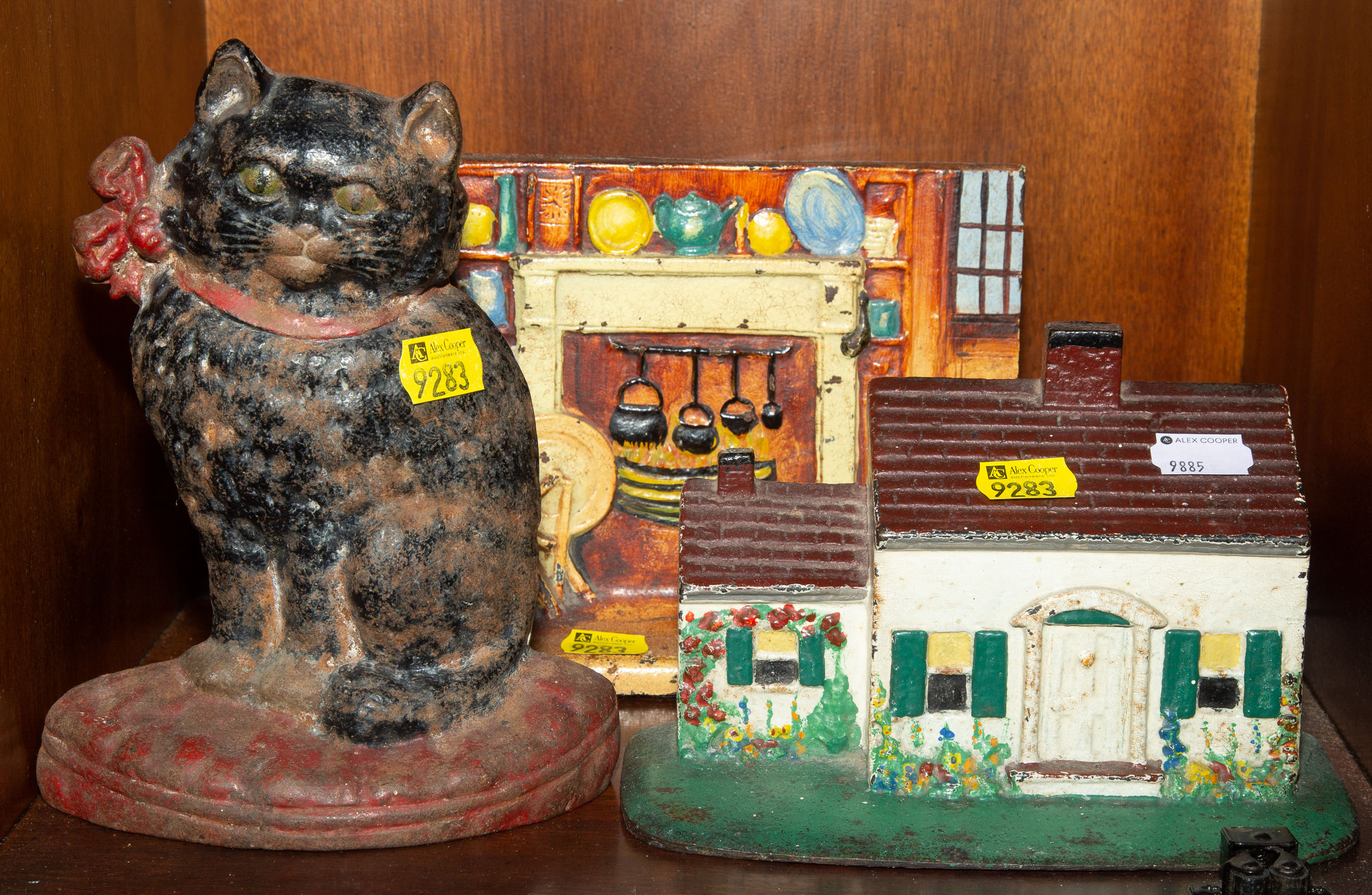 THREE VINTAGE PAINTED CAST IRON