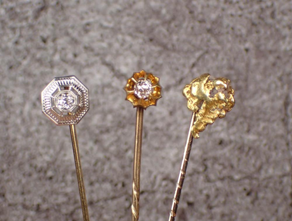 THREE VINTAGE STICK PINSTHREE