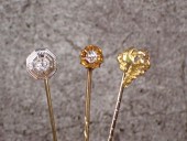 THREE VINTAGE STICK PINSTHREE