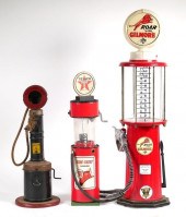THREE VINTAGE TOY GAS PUMPSThr