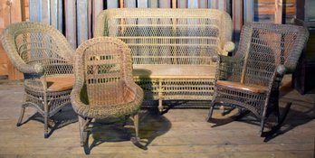 Three vintage wicker patio chairs