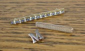 THREE VINTAGE YELLOW GOLD PINS