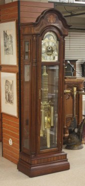 THREE-WEIGHT MAHOGANY TALL CAS