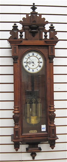 THREE-WEIGHT WALL CLOCK