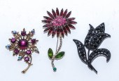 THREE WEISS BROOCHES Comprisin