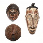 THREE WEST AFRICAN CARVED AND