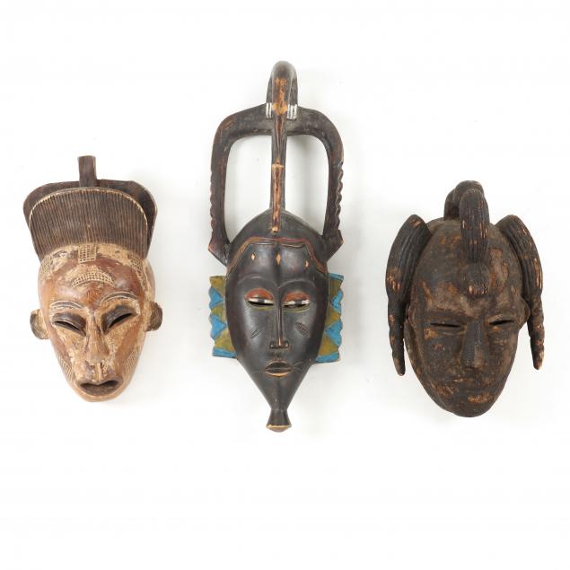 THREE WEST AFRICAN CARVED WOODEN