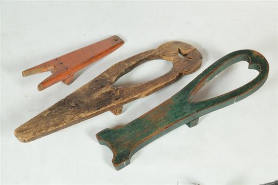 THREE WOODEN BOOTJACKS. 