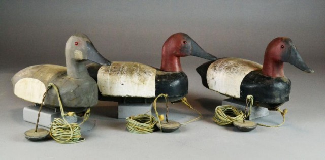 THREE WOODEN DUCK DECOYS 'PAUL