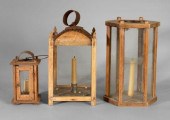 Three wooden lanterns: one wit