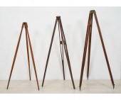 Three wooden transit tripods t