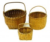Three woven baskets: one with