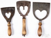 THREE WROUGHT IRON FOOD CHOPPE