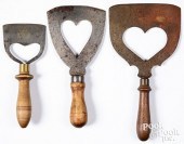THREE WROUGHT IRON FOOD CHOPPE