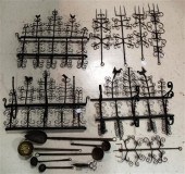 THREE WROUGHT IRON HANGING RAC