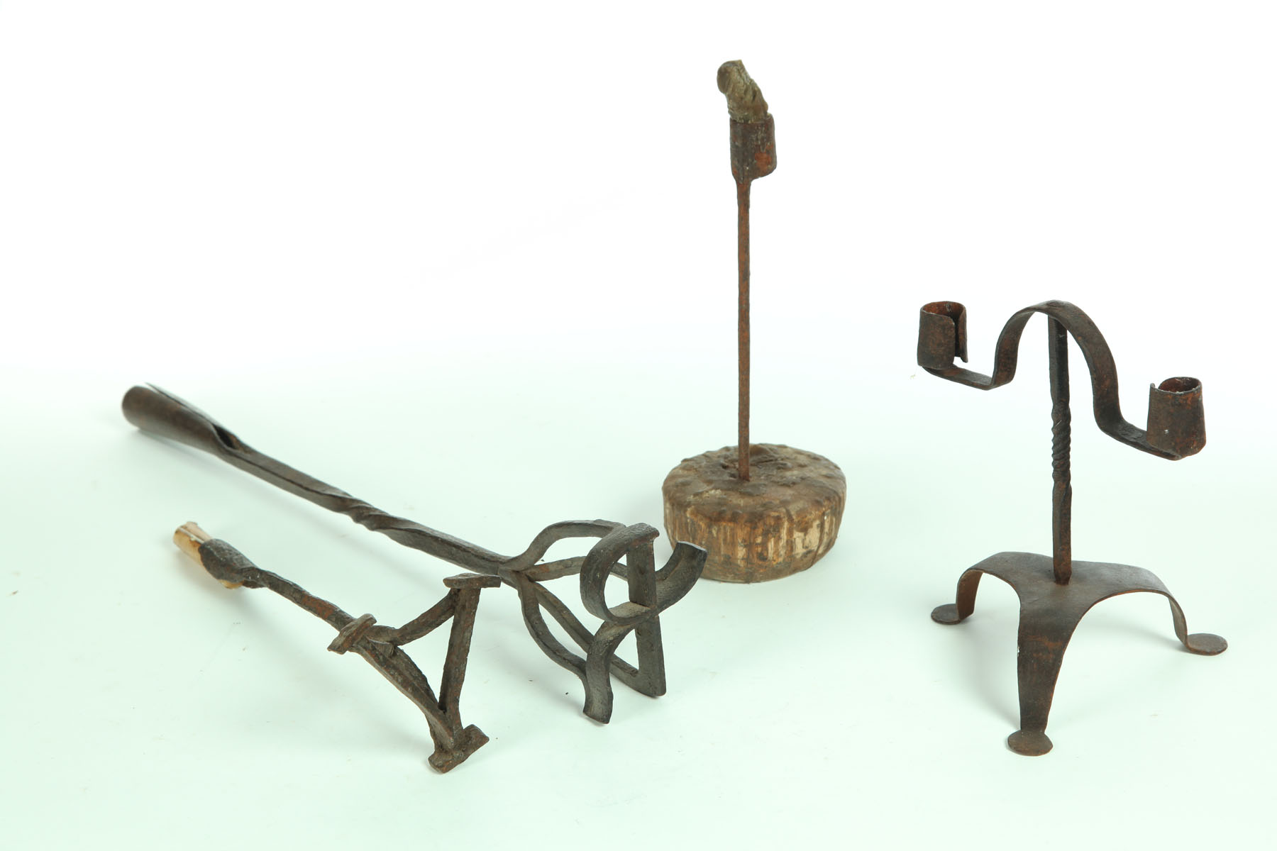 THREE WROUGHT IRON LIGHTING DEVICES