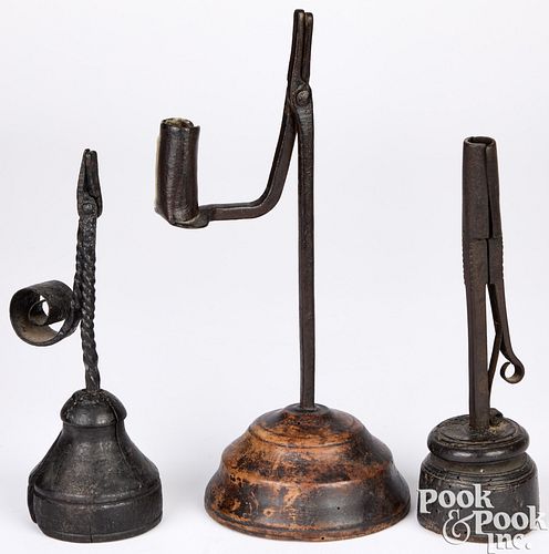THREE WROUGHT IRON RUSH LIGHTS,