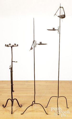 THREE WROUGHT IRON STANDING