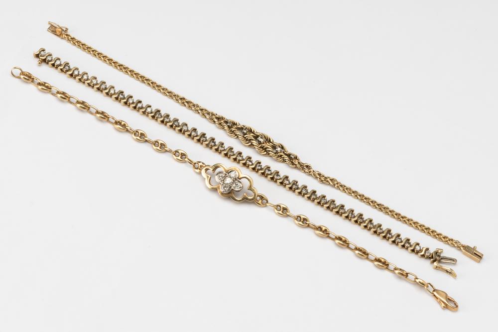 THREE YELLOW GOLD & DIAMOND