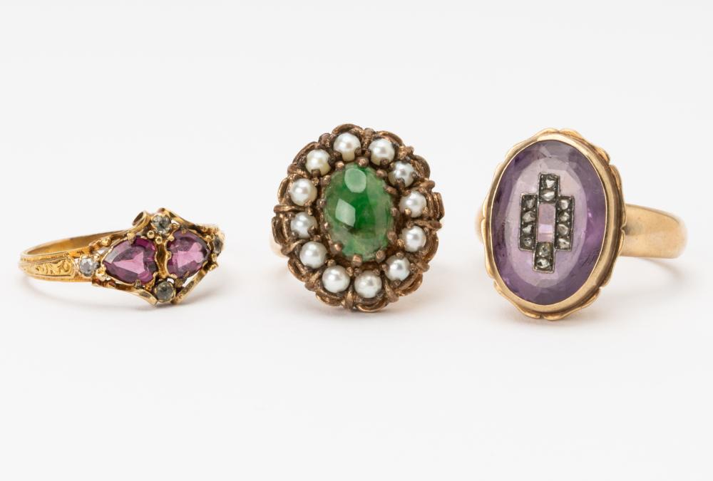 THREE YELLOW GOLD RINGSThree Yellow