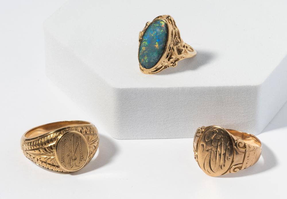 THREE YELLOW GOLD RINGSThree Yellow