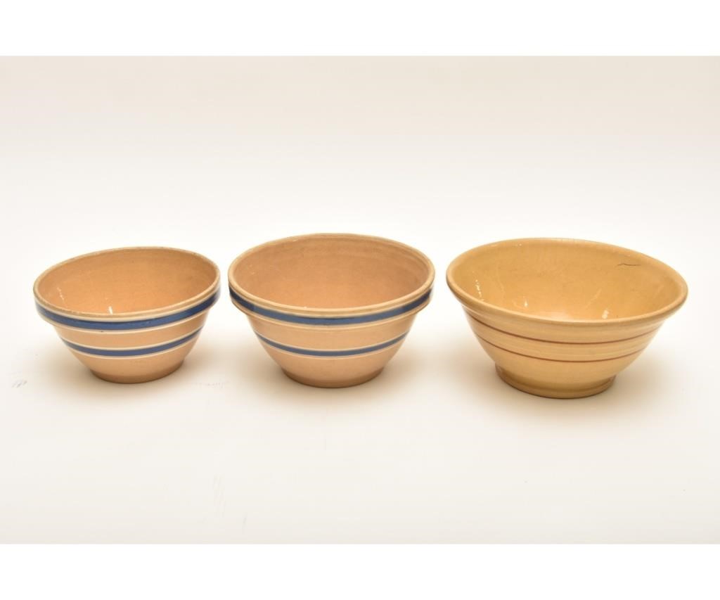 Three Yellowware mixing bowls