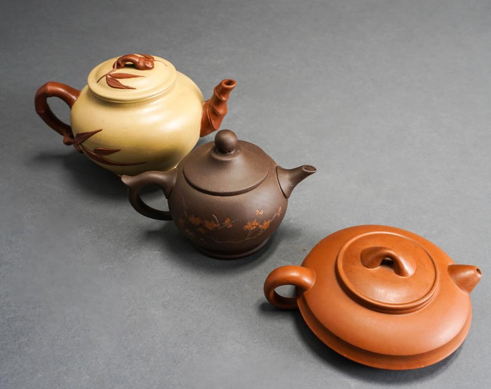 THREE YIXING WARE TYPE TEAPOTSThree