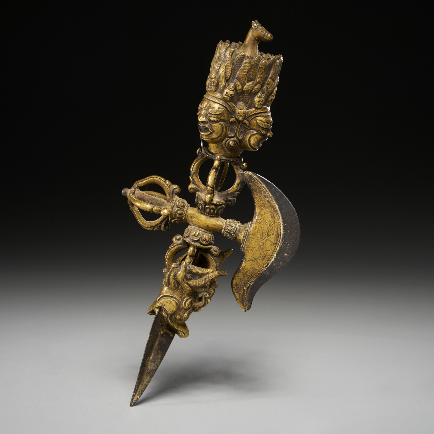 TIBETAN BRONZE AND IRON DORJE