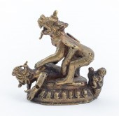 TIBETAN DIMINUTIVE GILT BRONZE