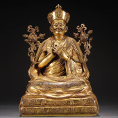 TIBETAN GILT BRONZE FIGURE OF
