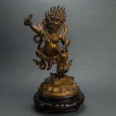 TIBETAN GILT BRONZE FIGURE OF