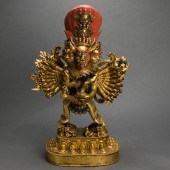 TIBETAN GILT BRONZE FIGURE OF