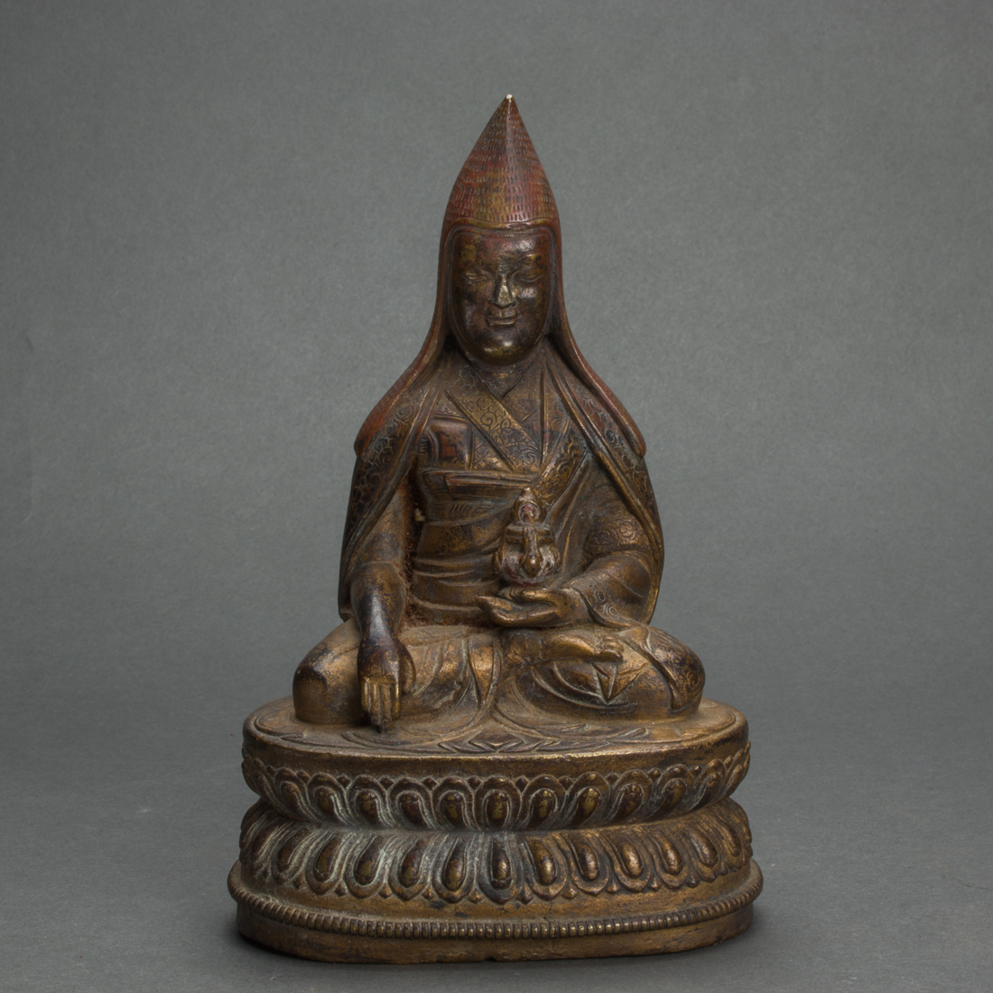 TIBETAN GILT BRONZE FIGURE OF A