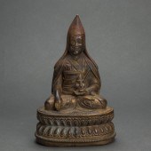 TIBETAN GILT BRONZE FIGURE OF