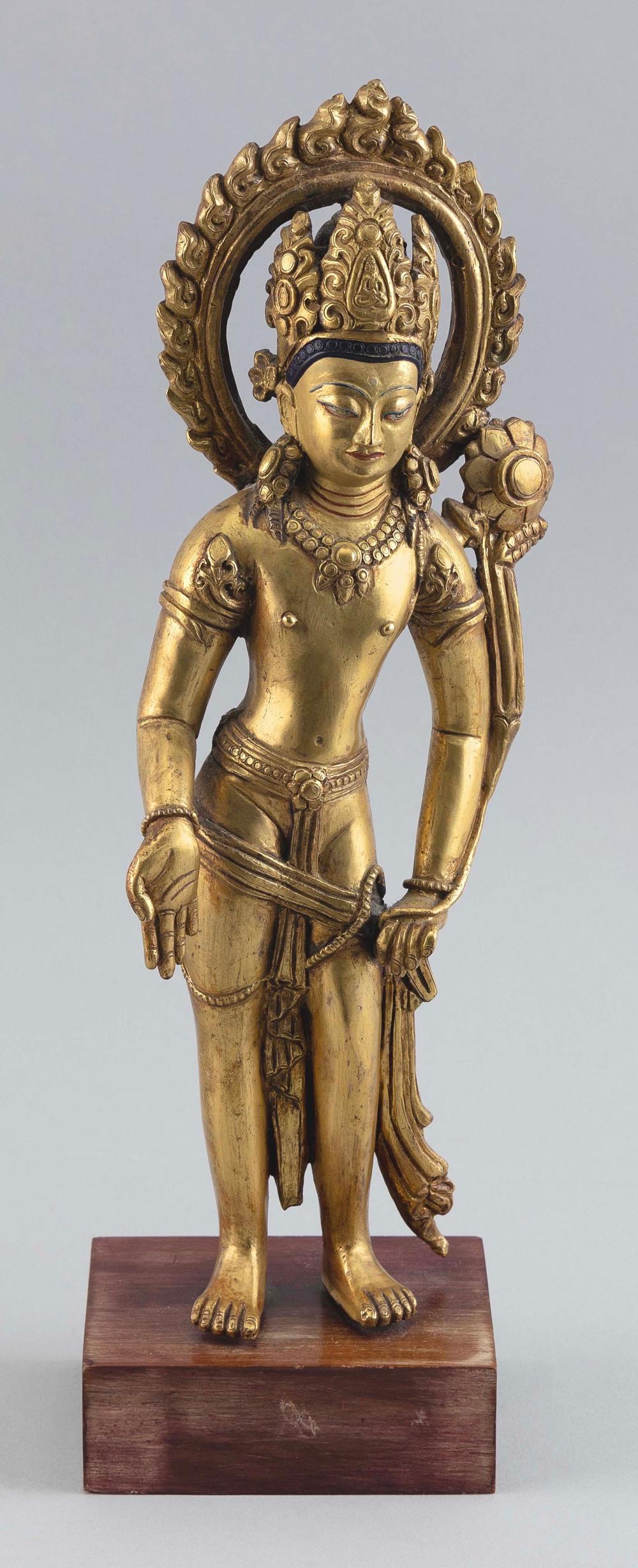 TIBETAN GILT-BRONZE FIGURE OF